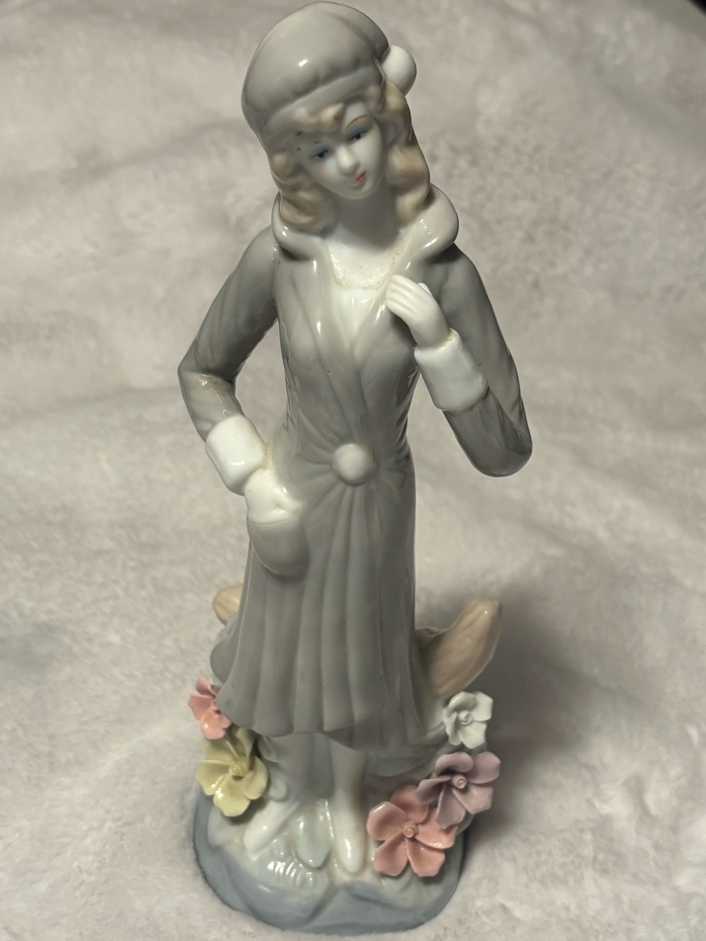 Vintage Porcelain Figurine Woman in Light Gray Coat with Pastel Flower Accents